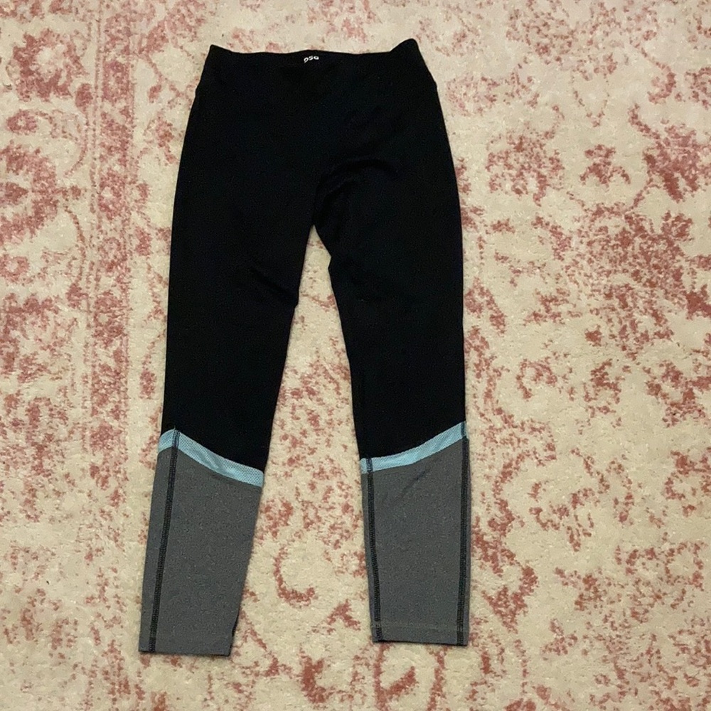 Black, blue, and grey exercise pants.